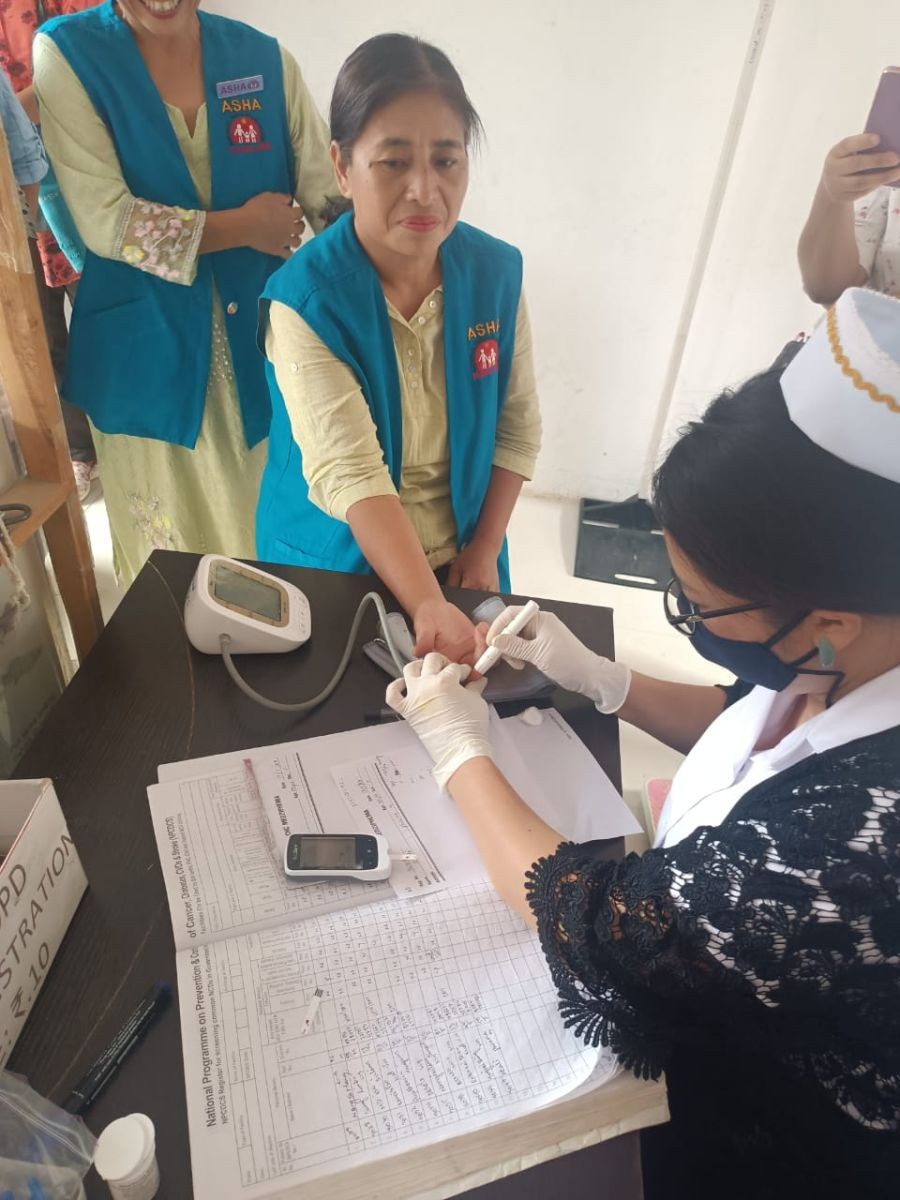A beneficiary avail screening for blood sugar during the observance of World Hypertension Day at CHC Medziphema on May 17.
